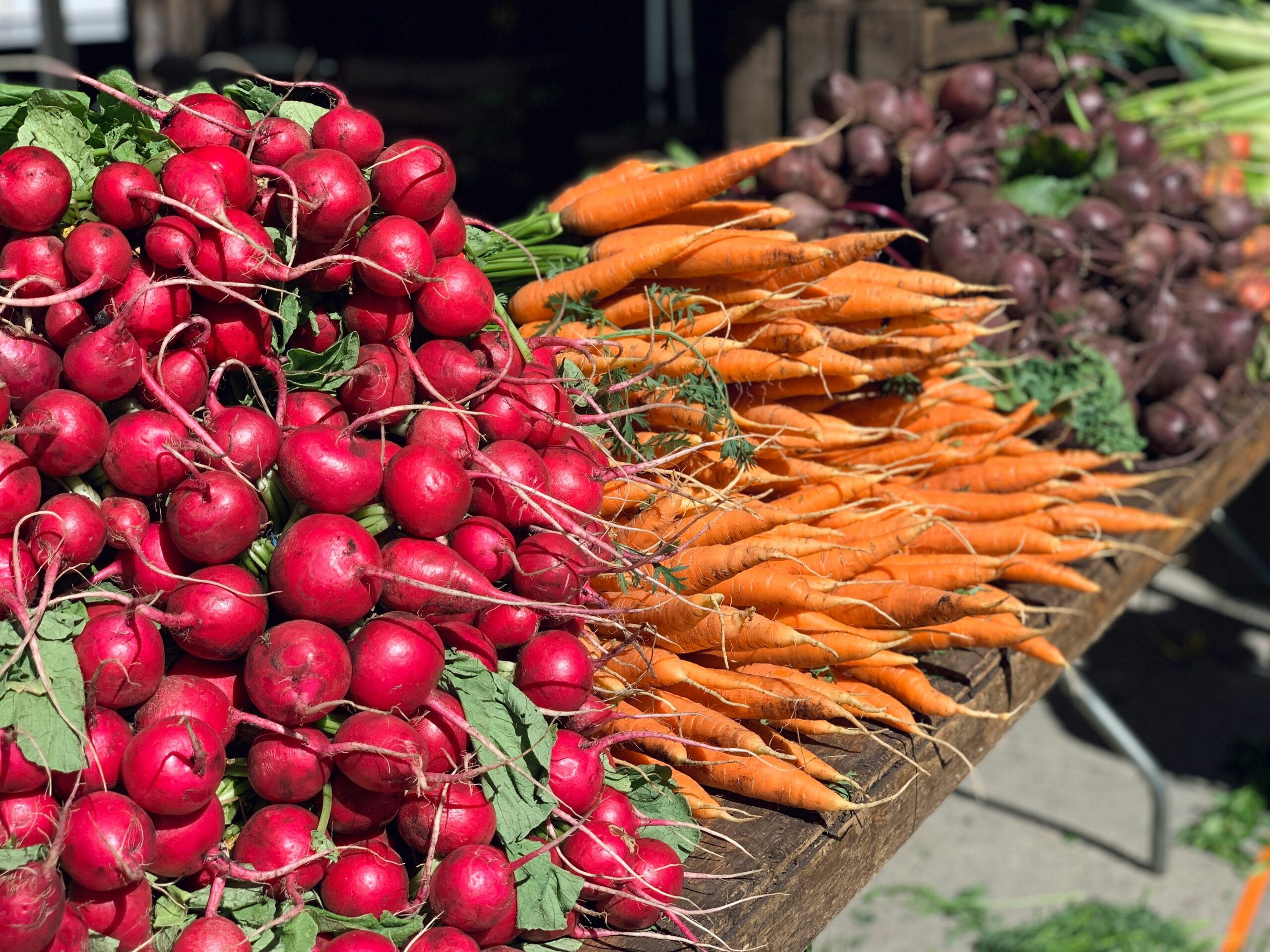 radishes, carrots and more on a table